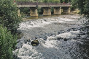 Bridge and cascading water in the Arlanzón River, Burgos