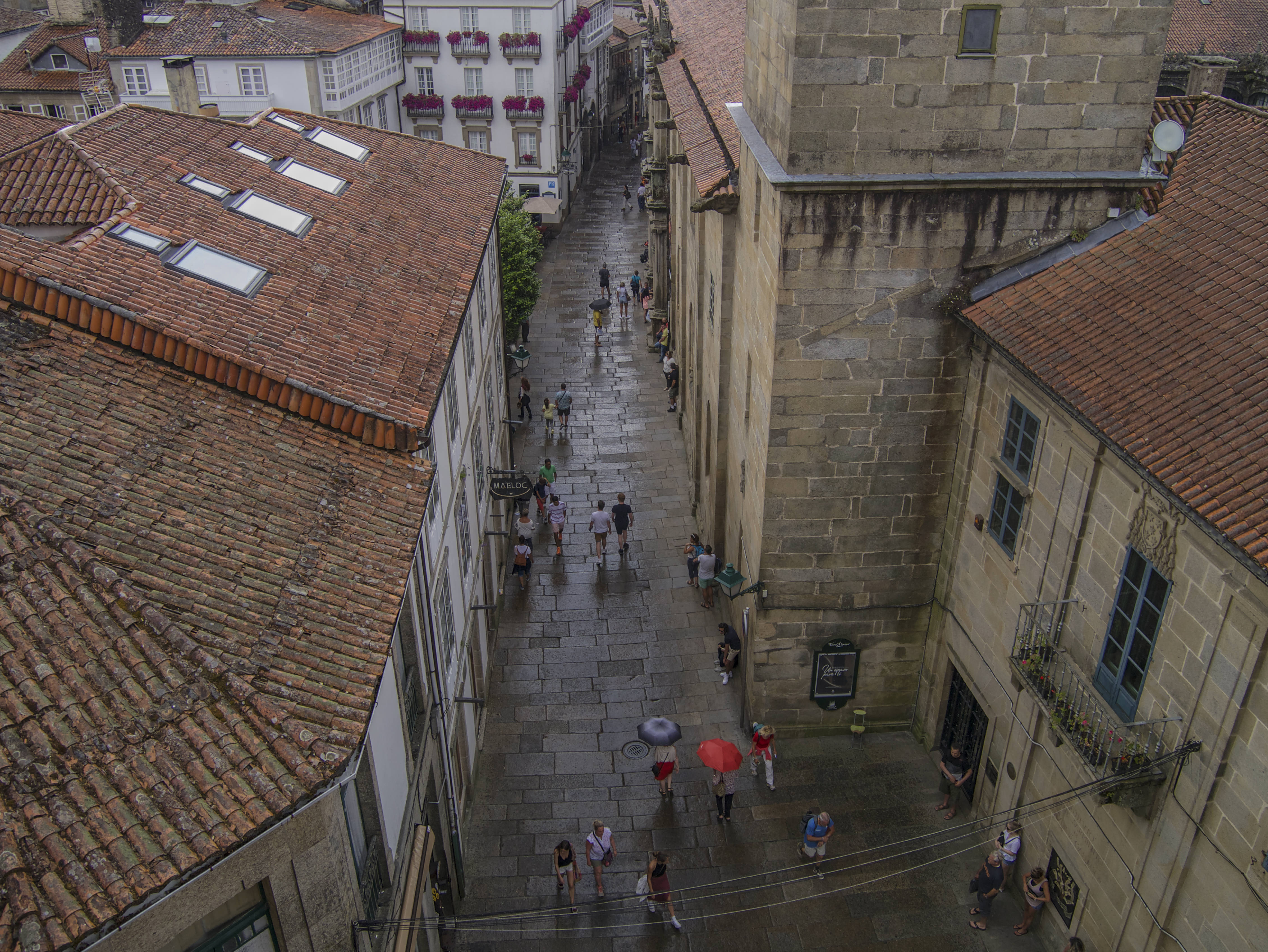View of Santiago street from above with umbrellas